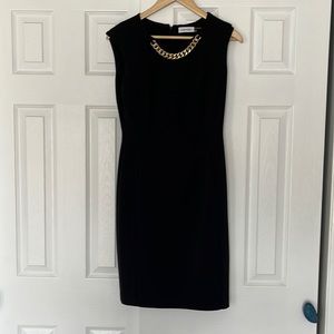 Calvin Klein size 4 black dress with attached neck chain